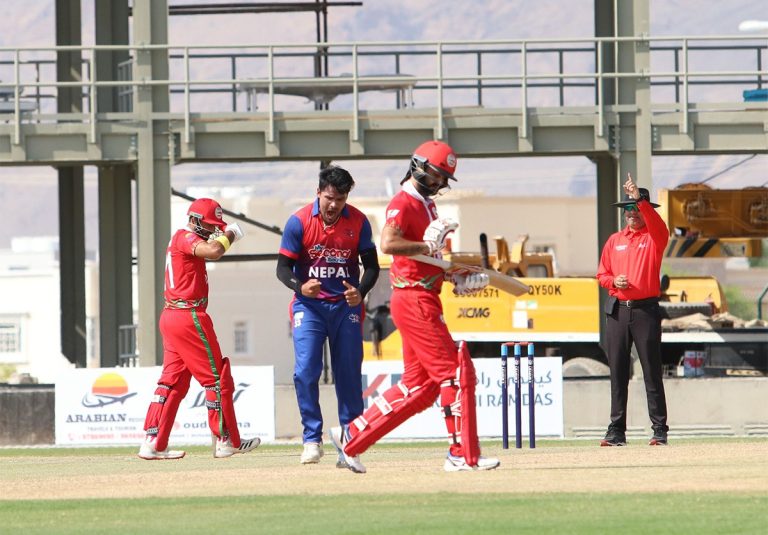 Karan & Lamichhane takes four-fer as Nepal restricts Oman to 121